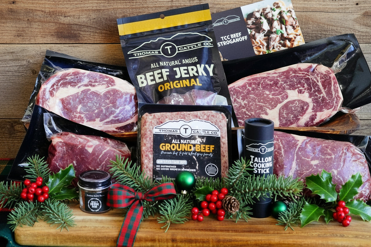 Assorted meats and a cooler bag on a table with a white background
